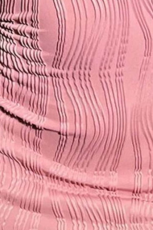 a close up of a pink dress with wavy lines