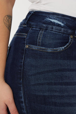 a close up of a person wearing a pair of jeans