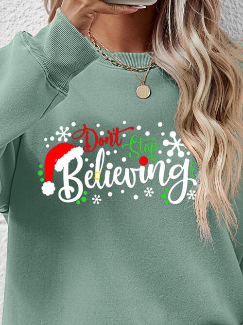 Don't Stop Believing Graphic Christmas Sweatshirt-MXSTUDIO.COM