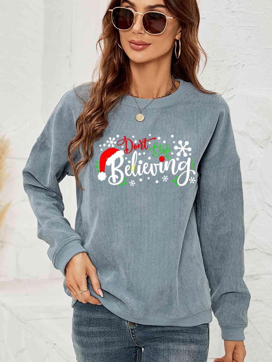 Don't Stop Believing Graphic Christmas Sweatshirt-MXSTUDIO.COM