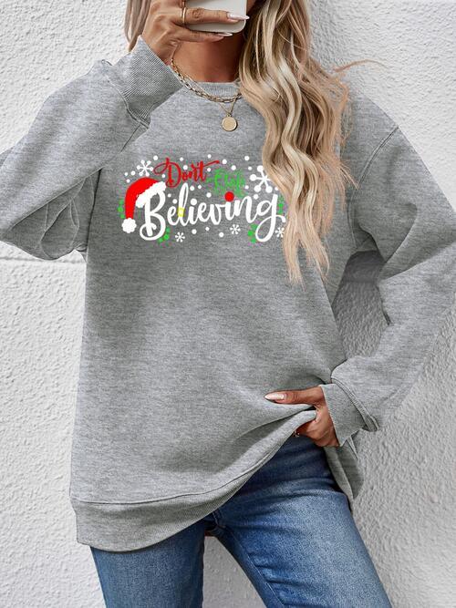 Don't Stop Believing Graphic Christmas Sweatshirt-MXSTUDIO.COM