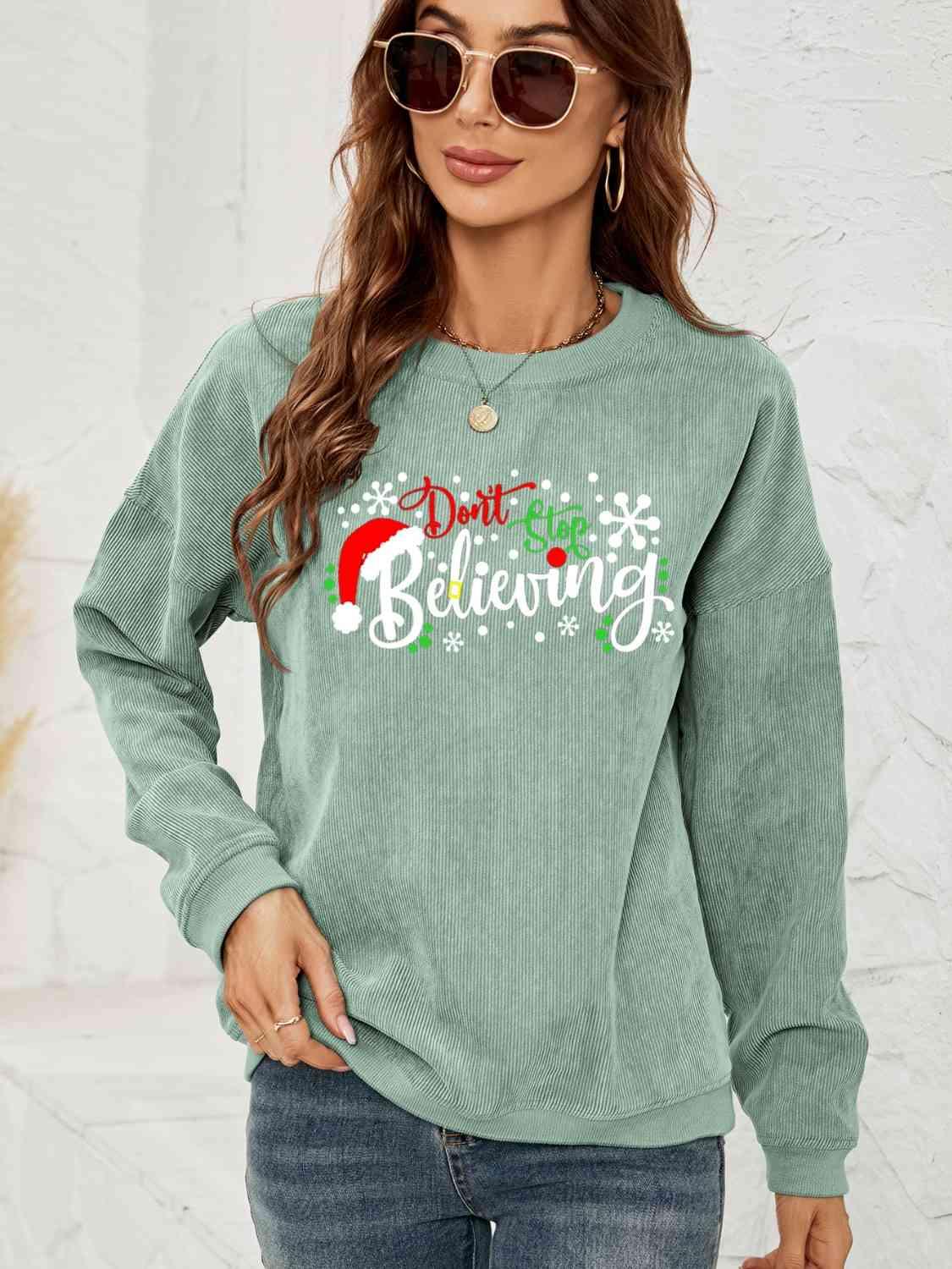 Don't Stop Believing Graphic Christmas Sweatshirt-MXSTUDIO.COM