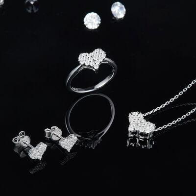 a collection of jewelry on a black background