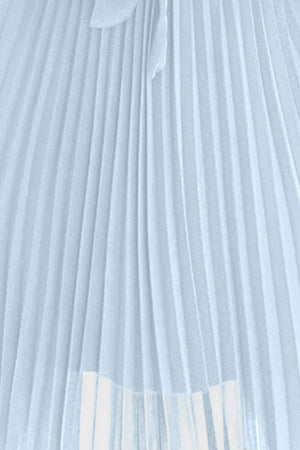 a white pleated skirt with a bow tie