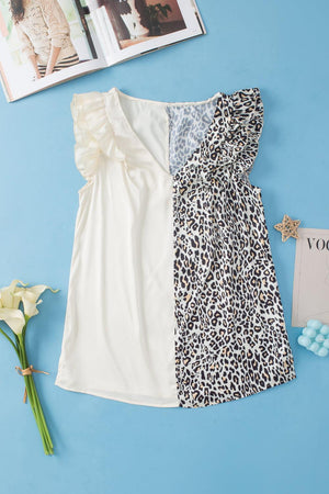 a white shirt with a leopard print on it next to a picture of a woman