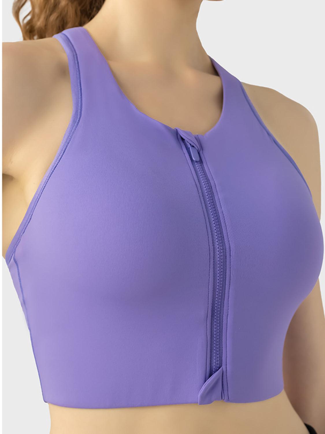 a woman wearing a purple sports bra top