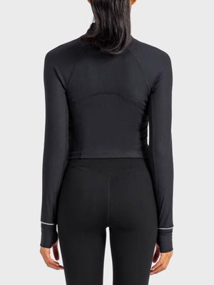 the back of a woman wearing a black wetsuit