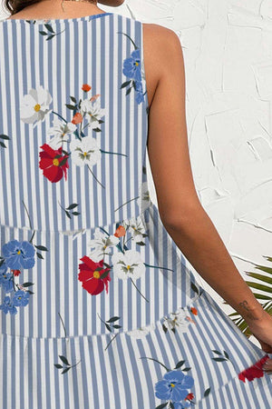 a woman wearing a blue and white striped dress