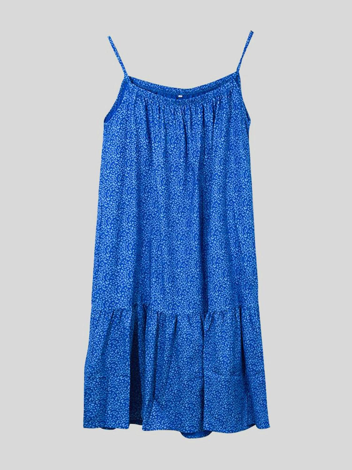 a blue dress hanging on a hanger