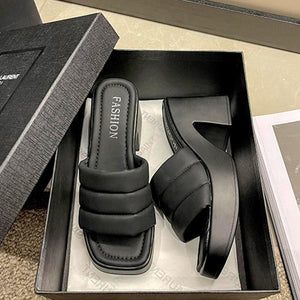 a box with a pair of shoes in it