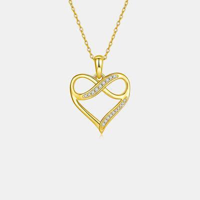 a heart shaped pendant with diamonds on a chain