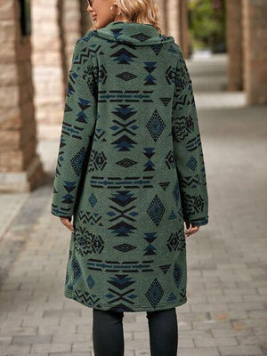 a woman standing on a sidewalk wearing a green coat