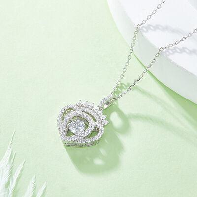 a diamond heart pendant on a chain