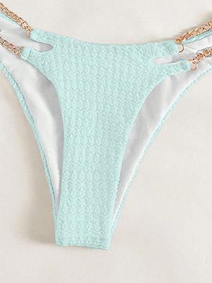 a women's bikini bottom with chains on the side