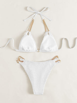 a white bikini top and a white bikini bottom