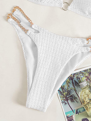 a woman's white bikini top and panties