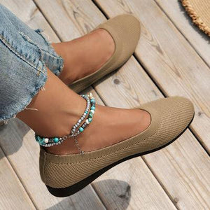 a close up of a person wearing a pair of shoes