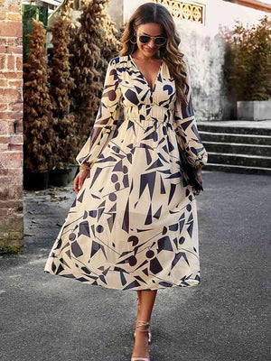 a woman walking down a street wearing a dress