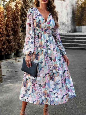 a woman wearing a floral print dress