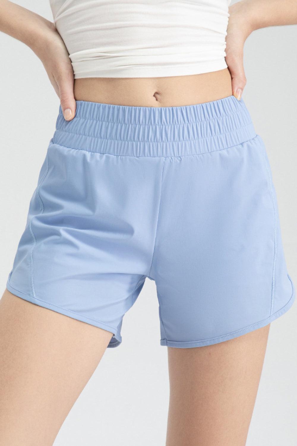 a close up of a person wearing shorts