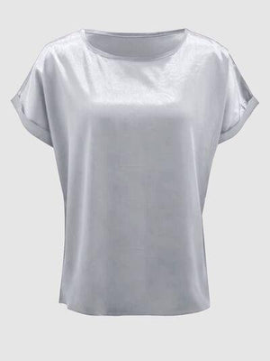 a women's white top with short sleeves