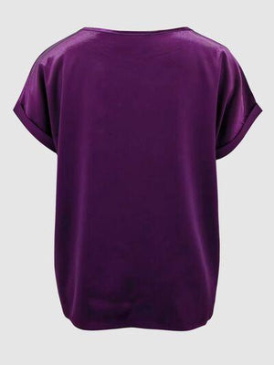 a women's purple top with short sleeves