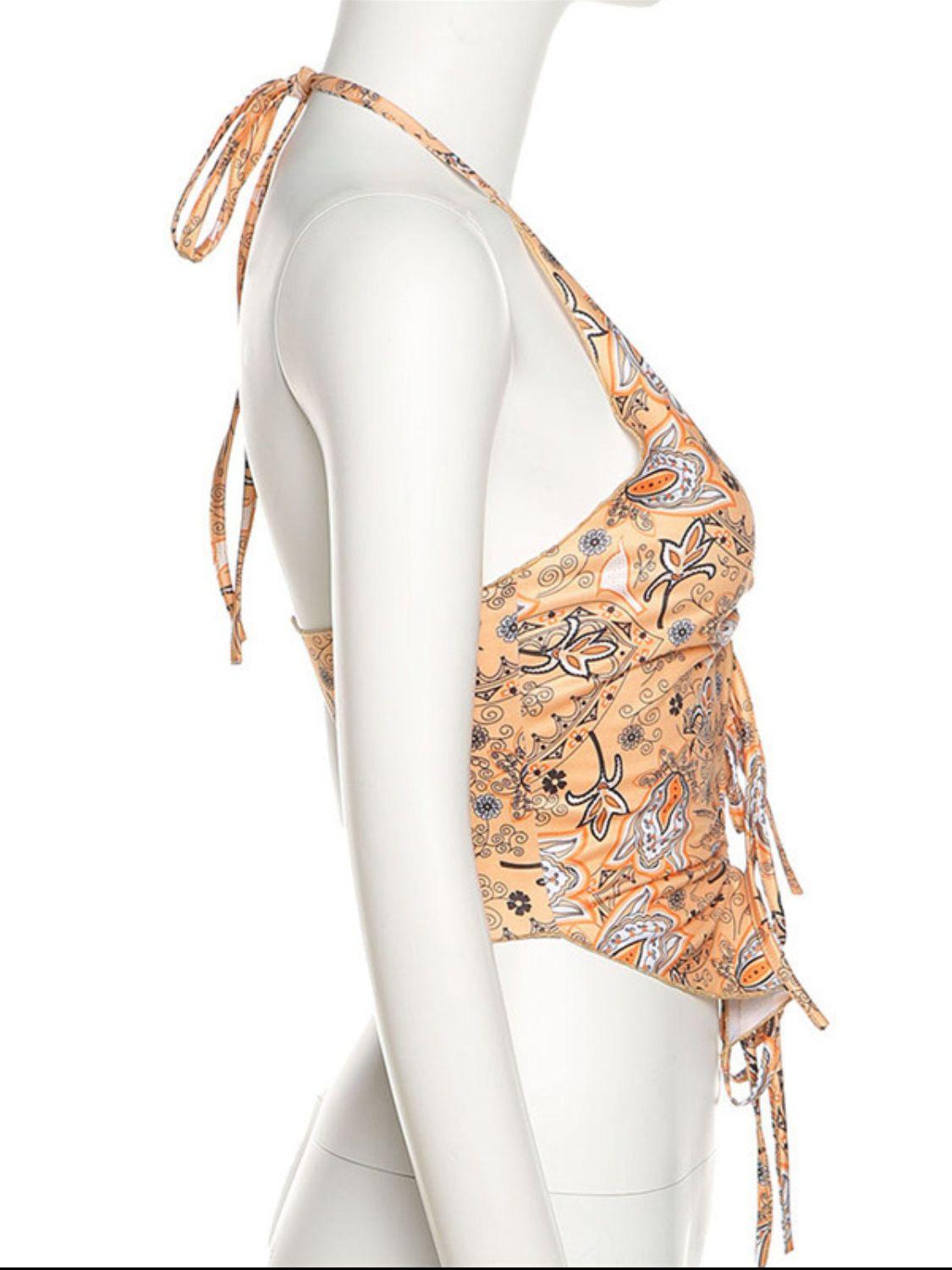 a mannequin wearing a bikini top with a tie around the neck