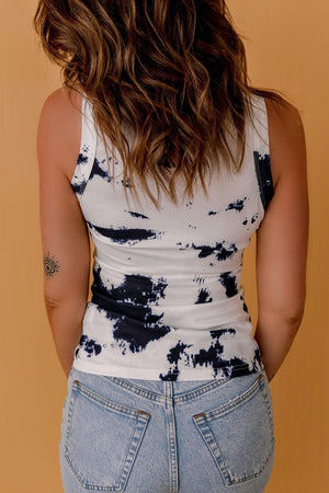 the back of a woman's body wearing a tank top