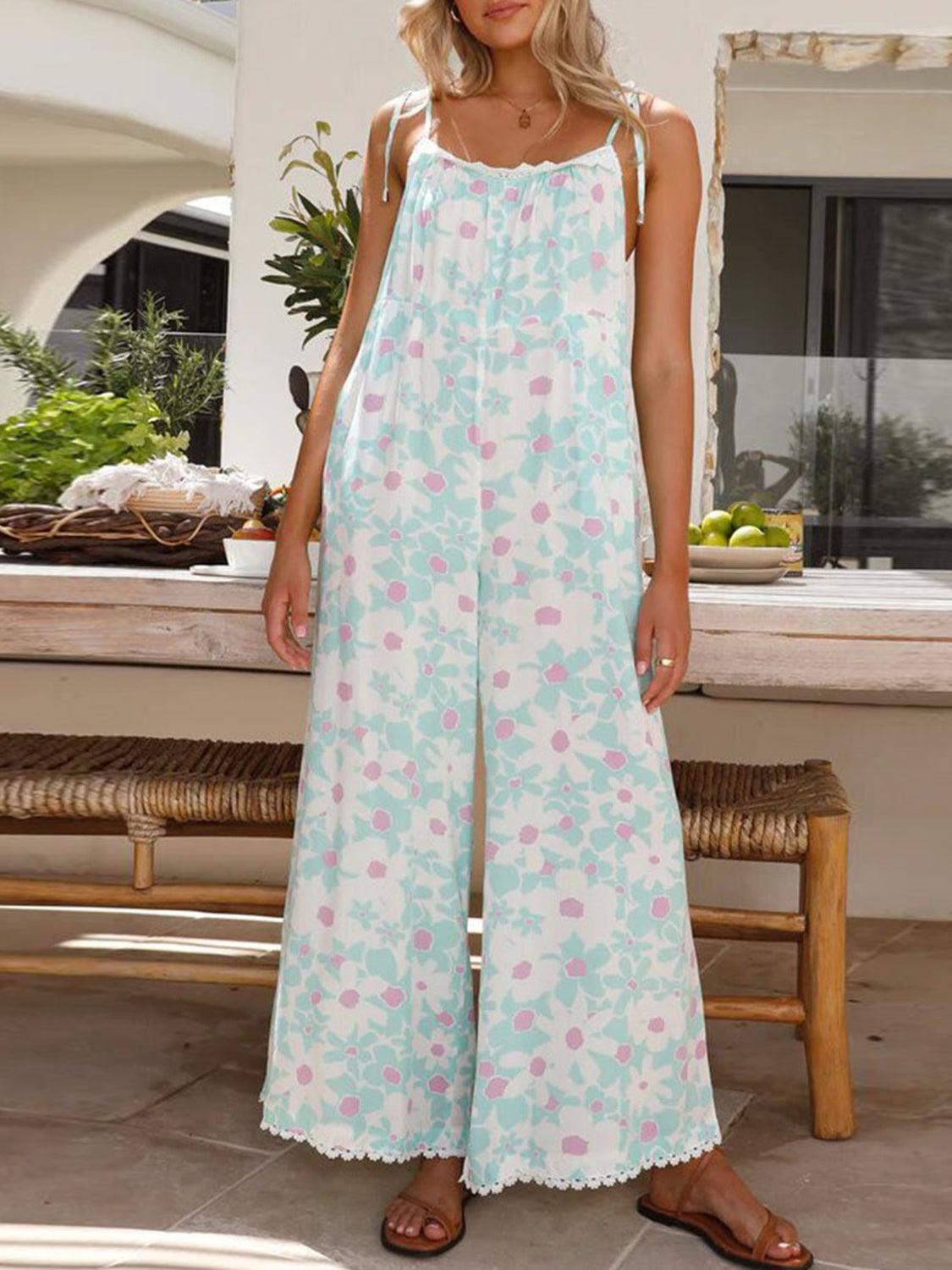 a woman standing in front of a table