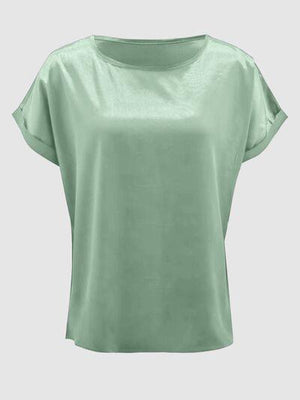 a women's green top with short sleeves