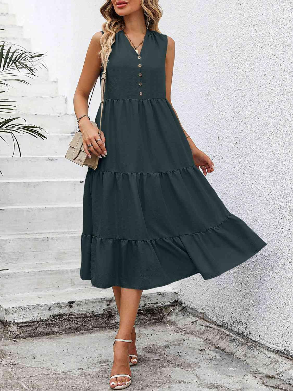 a woman wearing a green dress and sandals