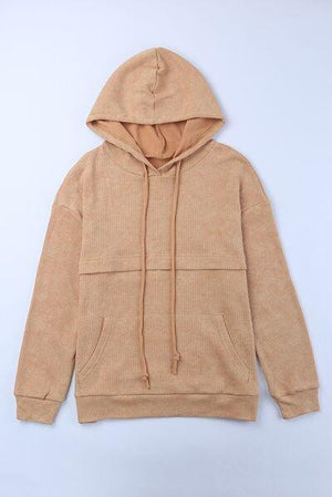 a brown hoodie with a white background