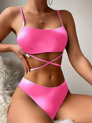 a woman in a pink bikini top and matching panties