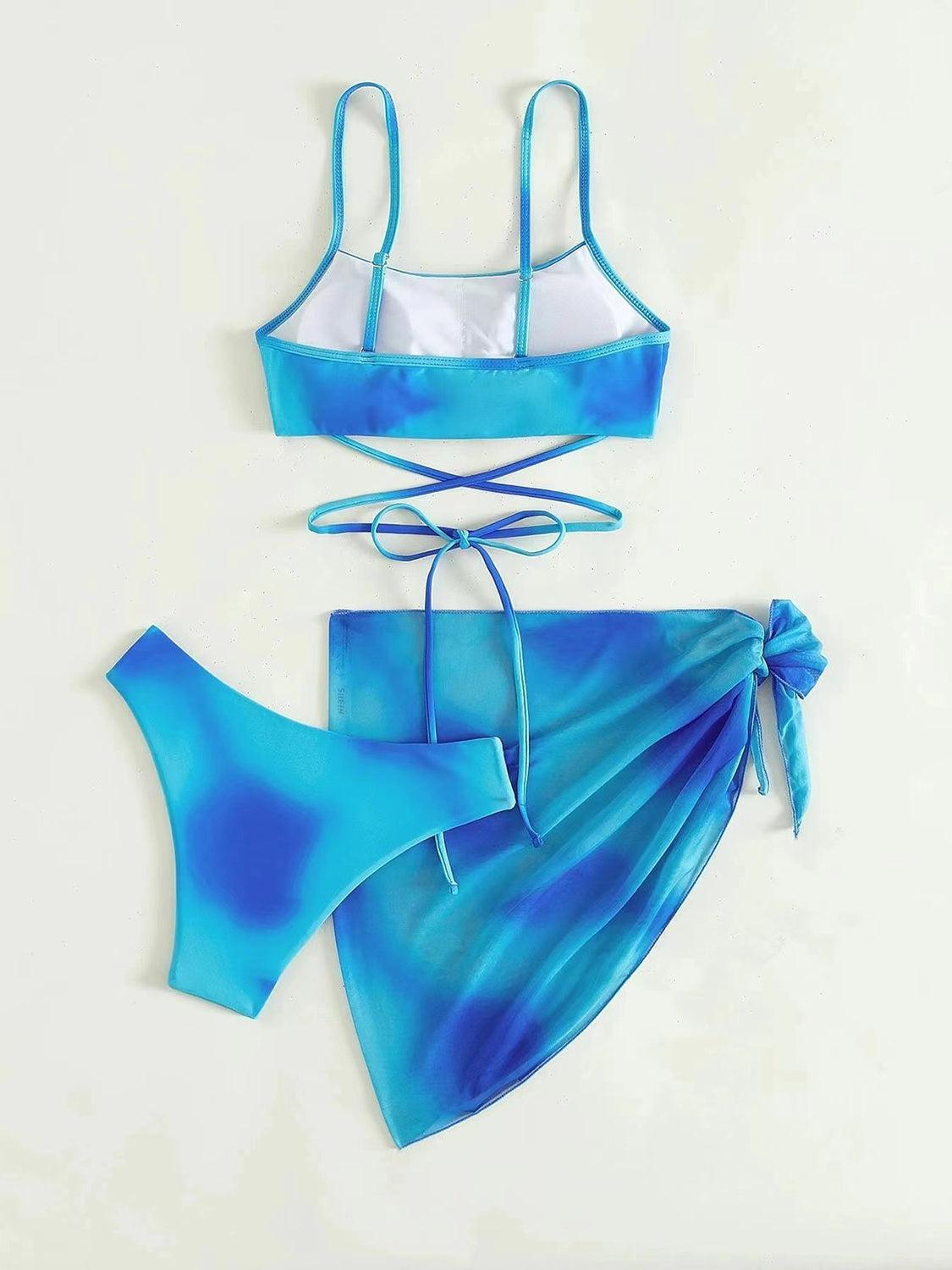 a blue and white bikini top and bottom