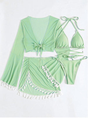 a woman's green bikinisuit and matching bra