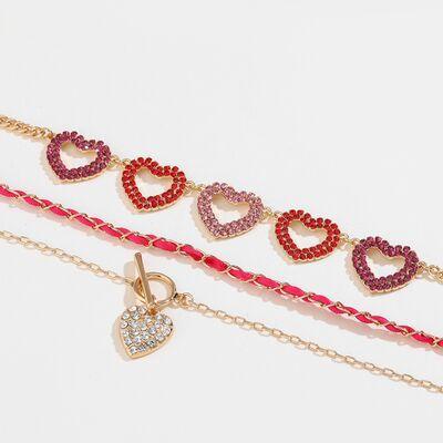 a row of bracelets with hearts on them