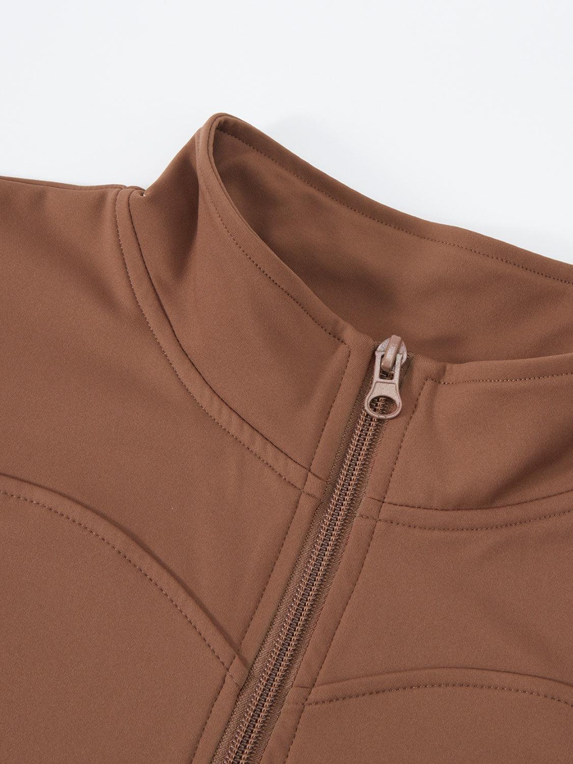 a close up of a brown jacket with a zipper