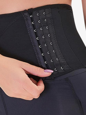 a close up of a woman wearing a black corset