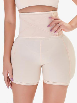 a woman in high waist shorts and a crop top