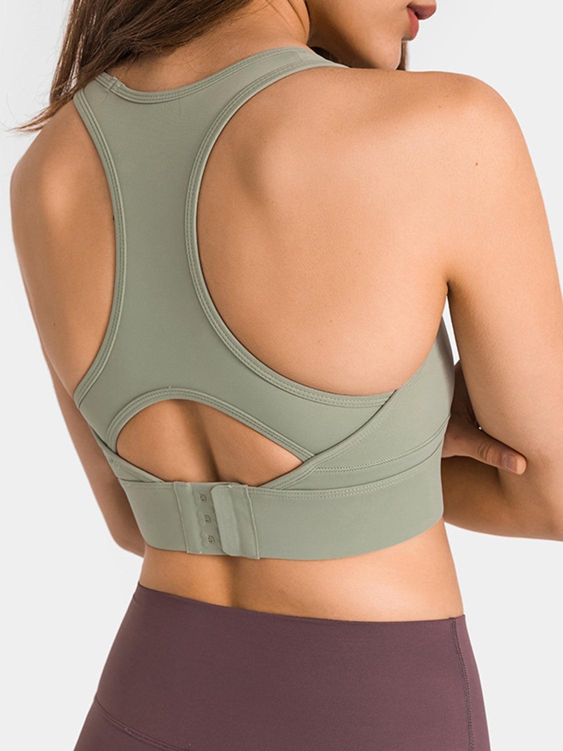 a woman wearing a sports bra top with a back cut out