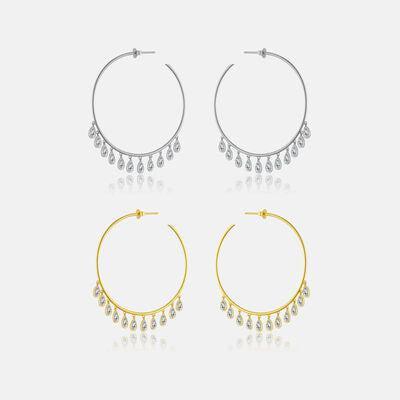 three pairs of gold and silver hoop earrings
