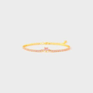 a yellow bracelet with a star on it