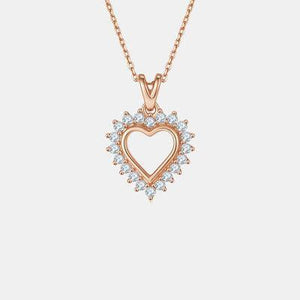 a diamond heart pendant on a chain