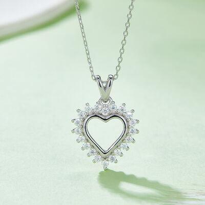 a necklace with a heart shaped pendant on a chain