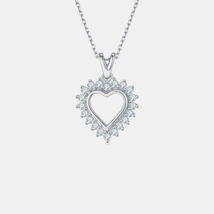 a diamond heart pendant on a chain