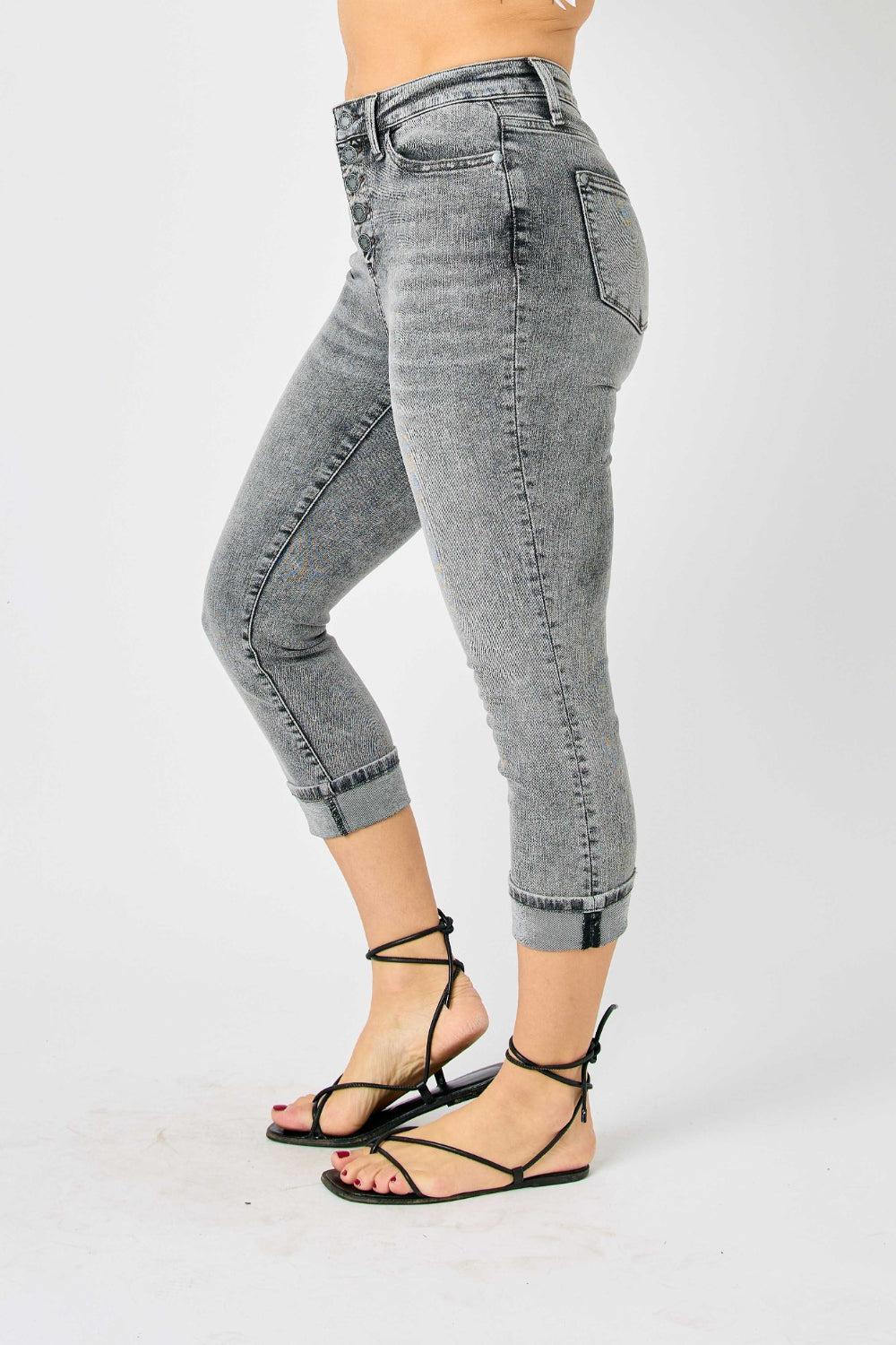 a woman in high heels is posing for a picture
