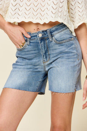 a close up of a person wearing shorts