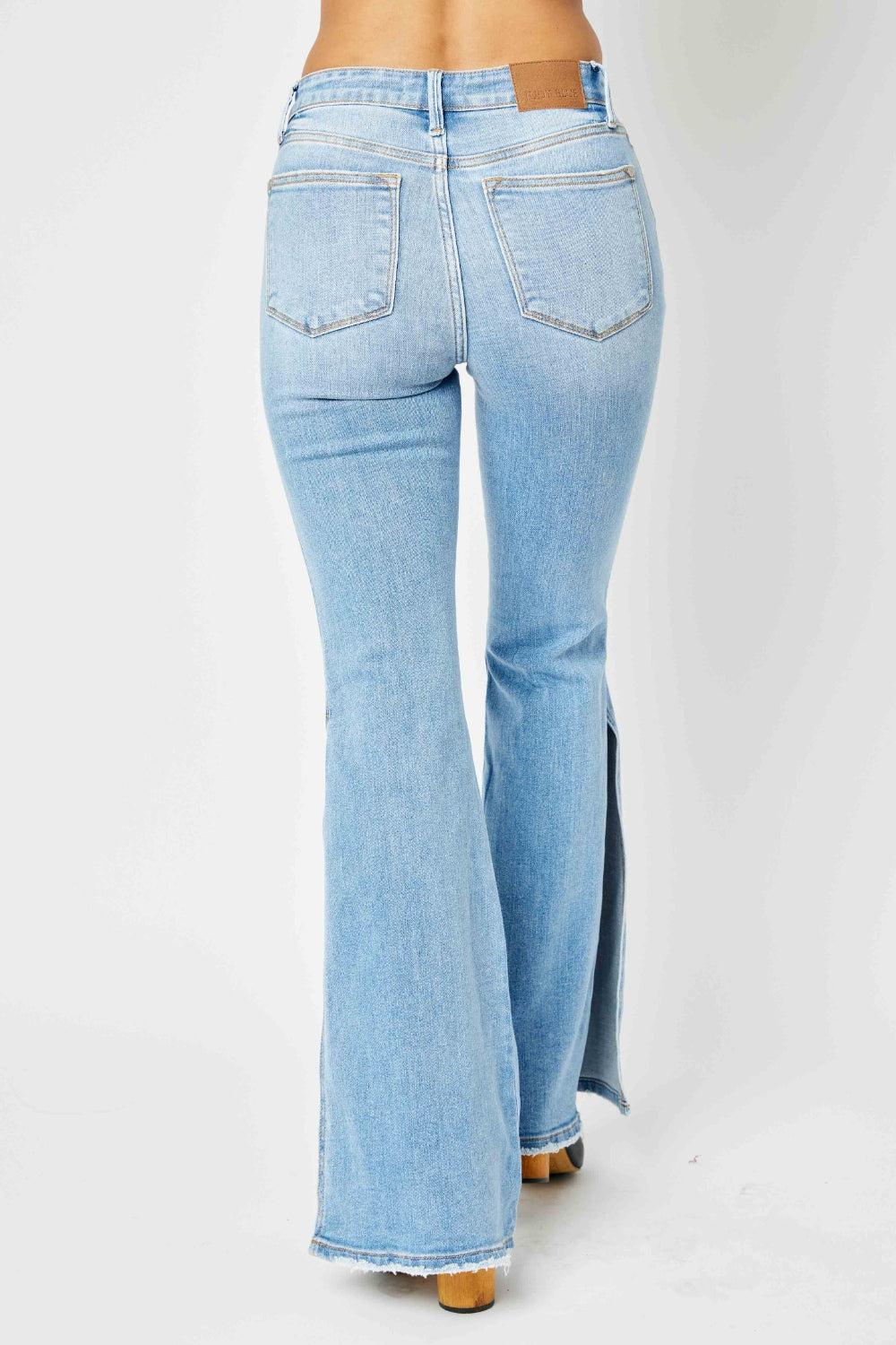 a woman wearing a pair of blue jeans