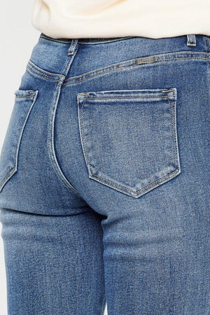 a woman wearing a pair of blue jeans