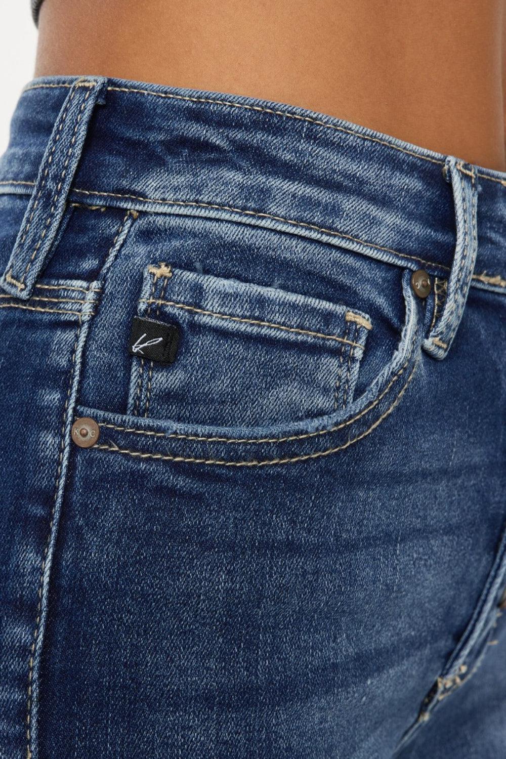 a close up of a person wearing jeans